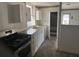 Modest kitchen featuring neutral cabinets, stainless steel appliances, and a double basin sink at 1907 Helm Ave, North Charleston, SC 29405
