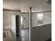 Shot of bright room with view of an doorway and window with AC unit at 1907 Helm Ave, North Charleston, SC 29405