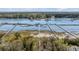Aerial view of several docks stretching into the water at 1988 Long Creek Rd, Wadmalaw Island, SC 29487
