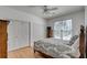 Bright bedroom features hardwood floors and double door closets at 1988 Long Creek Rd, Wadmalaw Island, SC 29487