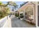 Inviting exterior deck offering ample seating and outdoor living space at 1988 Long Creek Rd, Wadmalaw Island, SC 29487