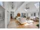 Bright living room boasting high ceilings, skylights and elegant furnishings at 1988 Long Creek Rd, Wadmalaw Island, SC 29487
