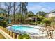 Relaxing backyard pool with lush landscape and a patio perfect for outdoor entertaining at 1988 Long Creek Rd, Wadmalaw Island, SC 29487