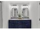 Bathroom featuring a double vanity with modern lighting and fixtures at 202 Basswood Ave, Summerville, SC 29483