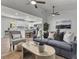 Open living space with access to the kitchen and comfortable seating at 202 Basswood Ave, Summerville, SC 29483