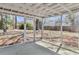 Relaxing screened-in porch offering views of the backyard and ample space to relax at 202 Basswood Ave, Summerville, SC 29483
