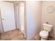 Clean bathroom featuring a shower with curtain, a white toilet, and a sink with vanity at 2293 Old Hwy 6, Cross, SC 29436