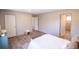 Spacious bedroom featuring an ensuite bathroom entrance, a bright window, and lots of space at 2293 Old Hwy 6, Cross, SC 29436