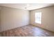 Comfortable bedroom featuring wood-look flooring and a bright window for plenty of natural light at 2293 Old Hwy 6, Cross, SC 29436