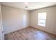 Comfortable bedroom featuring wood-look flooring and a bright window for plenty of natural light at 2293 Old Hwy 6, Cross, SC 29436