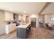 Spacious kitchen boasts an island with seating, stainless steel appliances, and a seamless flow to the dining area at 2293 Old Hwy 6, Cross, SC 29436