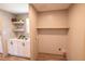 Laundry room with ample counter space, floating shelves, and in-unit washer-dryer hookups at 2293 Old Hwy 6, Cross, SC 29436