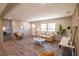 A well-lit living room showcases cozy furniture, wood flooring, and neutral wall colors at 2293 Old Hwy 6, Cross, SC 29436