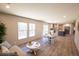 Open-concept living and dining area showcases wood floors and natural light at 2293 Old Hwy 6, Cross, SC 29436