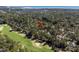 Picturesque aerial view of golf course community with waterway in the distance at 2440 Cat Tail Pond Rd, Seabrook Island, SC 29455