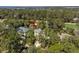 Birds eye view of the house with surrounding mature trees and lush landscaping at 2440 Cat Tail Pond Rd, Seabrook Island, SC 29455