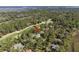 Aerial image showcasing property near golf course with mature landscaping and surrounding neighborhood at 2440 Cat Tail Pond Rd, Seabrook Island, SC 29455