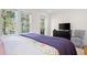 Bright bedroom with natural light from windows with views to the outside at 2440 Cat Tail Pond Rd, Seabrook Island, SC 29455
