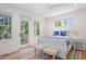 Charming bedroom with a bed and colorful rug, filled with natural light at 2440 Cat Tail Pond Rd, Seabrook Island, SC 29455