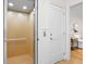 Interior view of a home elevator, showcasing its wood-paneled design and accessibility at 2440 Cat Tail Pond Rd, Seabrook Island, SC 29455