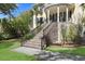 Close-up of the brick stairs leading to the front porch and welcoming entryway at 2440 Cat Tail Pond Rd, Seabrook Island, SC 29455