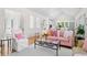 Comfortable living room with hardwood floors, neutral walls, and seamless access to the kitchen at 2440 Cat Tail Pond Rd, Seabrook Island, SC 29455