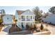 Inviting two-story home with a porch, balconies, lush landscaping, and a well-maintained yard at 2545 Hatch Dr, Johns Island, SC 29455