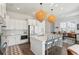 Beautiful kitchen with white cabinets, quartz countertops, and stainless steel appliances at 2545 Hatch Dr, Johns Island, SC 29455