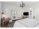 Bright main bedroom with a decorative chandelier, accent furniture, and modern decor at 2545 Hatch Dr, Johns Island, SC 29455