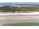 Wide aerial perspective displays the home's proximity to the beach, highlighting coastal living at 263 Pelican Flight Dr, 15.4% Share, Dewees Island, SC 29451
