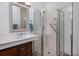 Bathroom featuring a vanity with a marble countertop and glass enclosed shower at 263 Pelican Flight Dr, 15.4% Share, Dewees Island, SC 29451