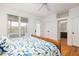 Bright bedroom featuring a bed and bath access at 263 Pelican Flight Dr, 15.4% Share, Dewees Island, SC 29451