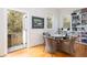 An interior dining room with a view of a patio at 263 Pelican Flight Dr, 15.4% Share, Dewees Island, SC 29451
