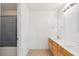 Bathroom featuring double sinks, wood cabinets, and a shower with grey curtain at 265 Grand Oaks Drive Dr, Ladson, SC 29456