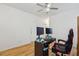 Bright bedroom featuring hardwood floors, a ceiling fan, and white walls at 265 Grand Oaks Drive Dr, Ladson, SC 29456