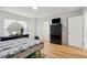 Well-lit bedroom with hardwood floors, window, dresser and closet at 265 Grand Oaks Drive Dr, Ladson, SC 29456