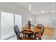Cozy breakfast nook with round table and four chairs located off living area at 265 Grand Oaks Drive Dr, Ladson, SC 29456