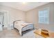 Comfortable bedroom with neutral decor, window, and simple furnishings at 2739 Calico Bass Ln, Johns Island, SC 29455