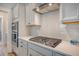 Kitchen details with white cabinets, modern appliances, and stylish countertops at 2739 Calico Bass Ln, Johns Island, SC 29455