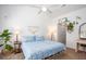 Comfortable bedroom featuring a cozy bed, natural light, and minimalist decor at 275 Kelsey Blvd, Charleston, SC 29492