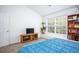 Bedroom with bright natural light, storage shelves, and a wall-mounted TV at 275 Kelsey Blvd, Charleston, SC 29492