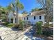 Charming white clubhouse with well-maintained landscaping and accessible ramp entry at 275 Kelsey Blvd, Charleston, SC 29492
