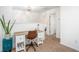 Upstairs home office features a desk, chair, and a view into an adjacent bedroom at 275 Kelsey Blvd, Charleston, SC 29492