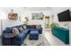 Comfortable living room featuring a sectional sofa, modern decor, and a bright airy feel at 275 Kelsey Blvd, Charleston, SC 29492