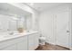 Bright bathroom with double vanity, framed mirror, and a glass-door shower for a clean, modern look at 284 Shadybrook Dr, Summerville, SC 29486