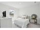 Cozy bedroom features a plush bed near a window, complemented by stylish side tables for a serene retreat at 284 Shadybrook Dr, Summerville, SC 29486