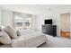 Cozy bedroom featuring carpet, a comfy bed, great natural light, and stylish decor at 284 Shadybrook Dr, Summerville, SC 29486