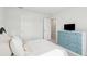 Bright bedroom featuring a bed, blue dresser, two doors, offering a serene retreat at 284 Shadybrook Dr, Summerville, SC 29486