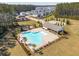 Aerial view of community pool showcasing ample green space and surrounding neighborhood at 284 Shadybrook Dr, Summerville, SC 29486