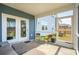 Relaxing screened-in porch with outdoor seating, a carpet and a view of the backyard at 284 Shadybrook Dr, Summerville, SC 29486